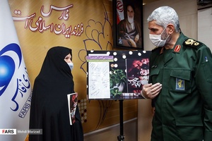 گفت وگوی سردار علی فضلی و طوبی زرندی همسر شهید بابا رجب محمدزاده در پایان مراسم رونمایی از کتاب بابارجب