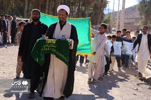 گرداندن پرم های آستان مقدس حضرت امام رضا(ع) و حضرت سید علاءالدین حسین در دهستان هودیان 