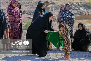 پرچم بارگاه ملکوتی حضرت امام رضا(ع) در روستای هودیان