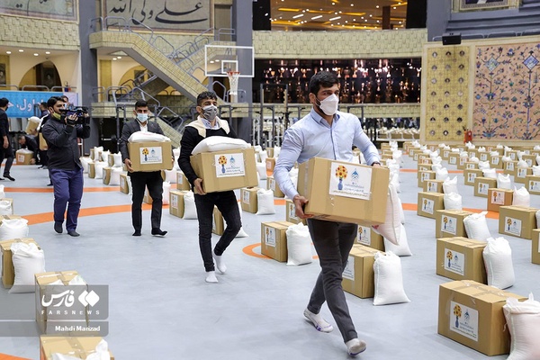 حضور قهرمانان و مدال‌آوران کشتی در مراسم پویش کمک مؤمنانه در خانه کشتی شهید صدرزاده 